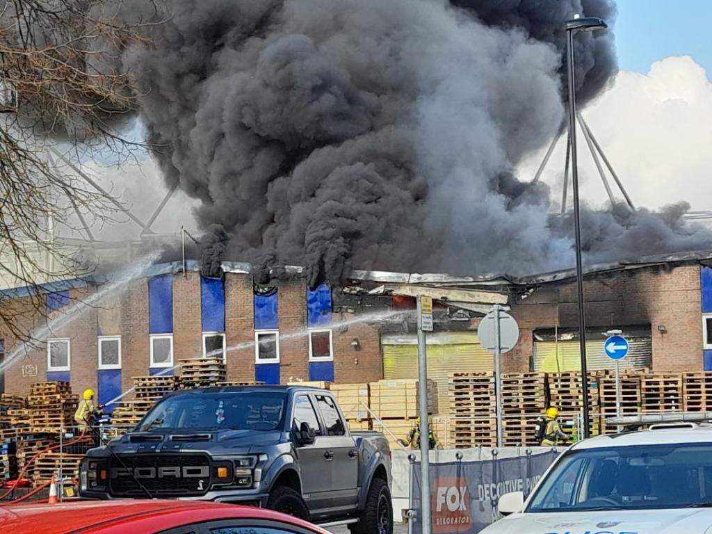 A fire at a warehouse outside St Mary's Stadium, Southampton