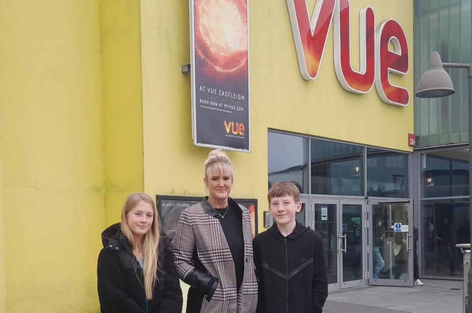 Holly, Jeana, and Isaac Palmer outside Vue